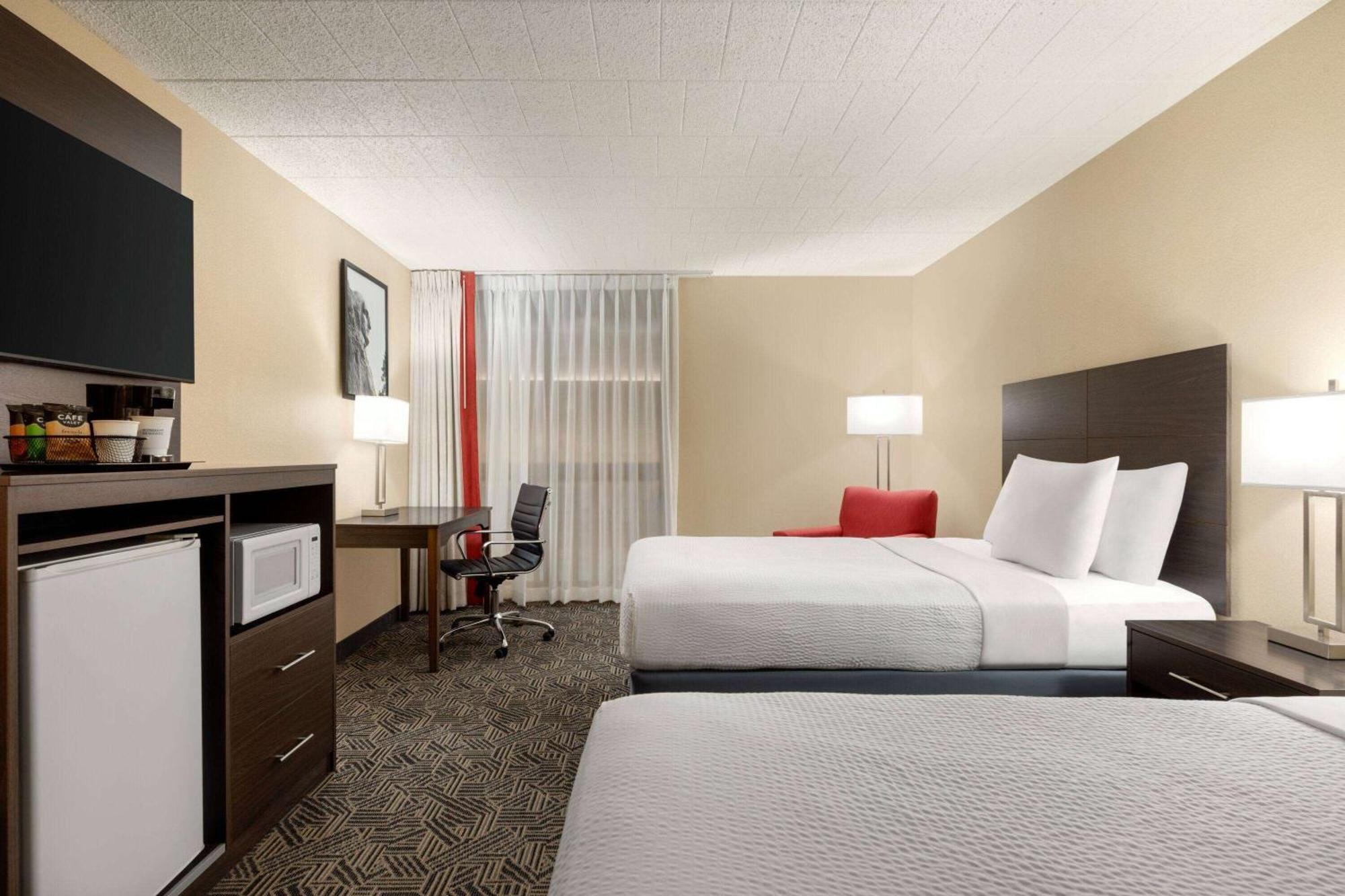 Hotel Ramada By Wyndham Alpena Exterior foto